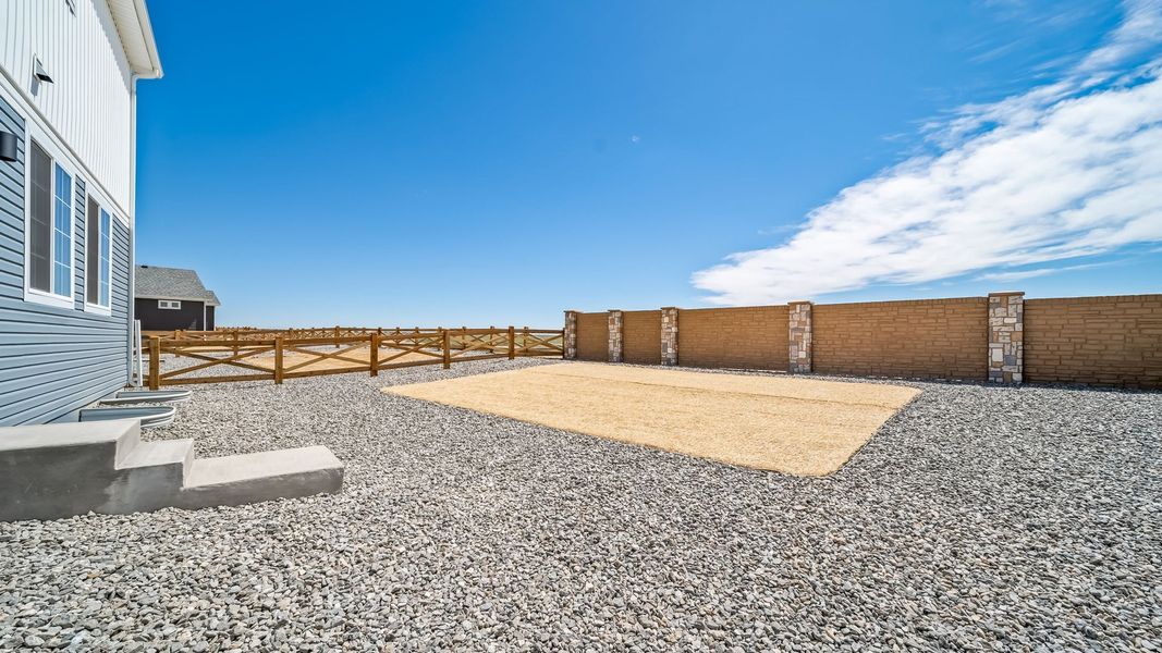 Exterior details and patio area of a home in Banning Lewis Ranch - New Homes Colorado Springs, Colorado Springs (Image 26). Exterior details and patio area of a home in Banning Lewis Ranch - New Homes Colorado Springs, Colorado Springs (Image 26).