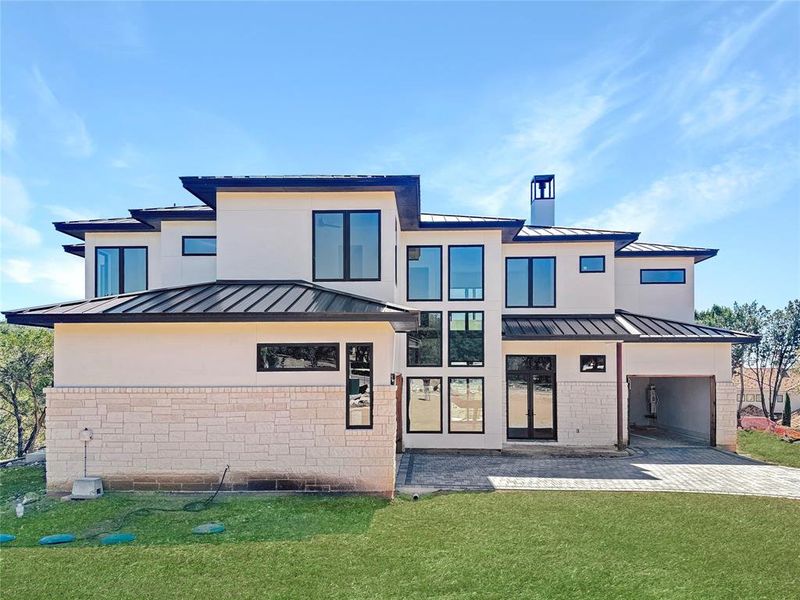 While the home is still in the construction phase, the burgeoning magnificence is already evident. Grass virtually added.