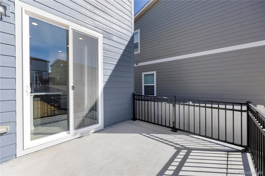 Exterior details and patio area of a home in Anthology North, Parker (Image 27).