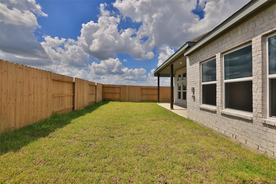 Exterior details and patio area of a home in River Ranch, Dayton (Image 24). Exterior details and patio area of a home in River Ranch, Dayton (Image 24).