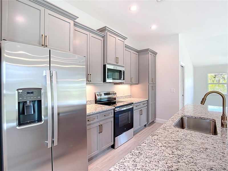 Furnished interior view inside a new home in , Port Charlotte (Image 7).