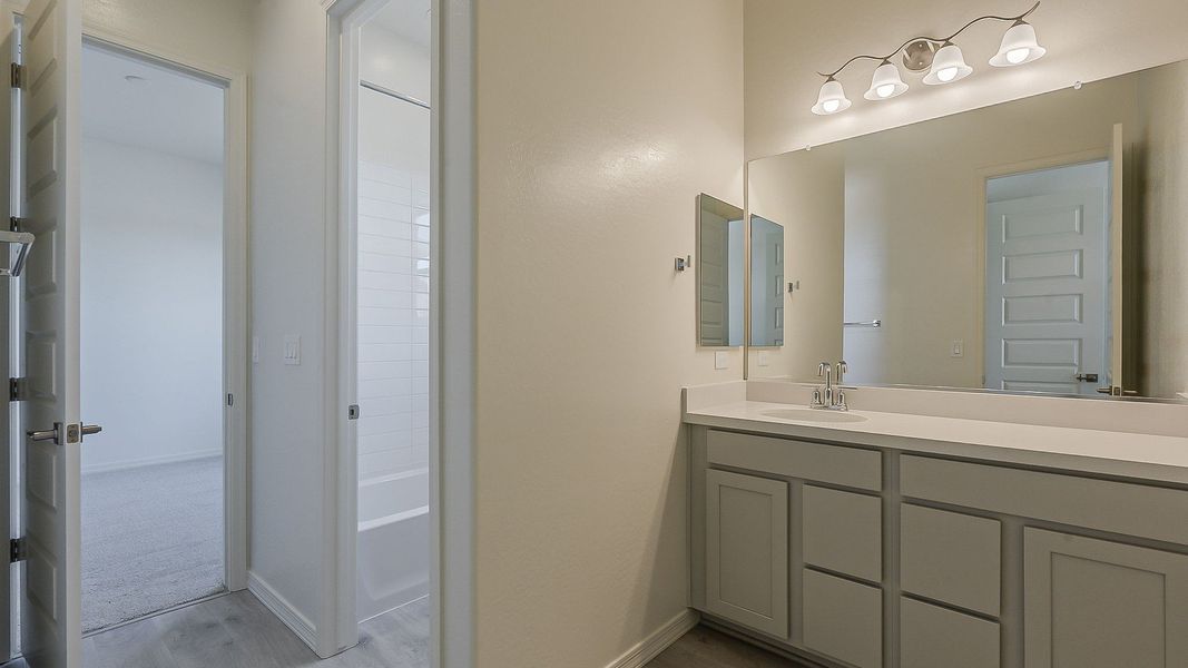 Furnished interior view inside a new home in Windrose, Waddell (Image 37).