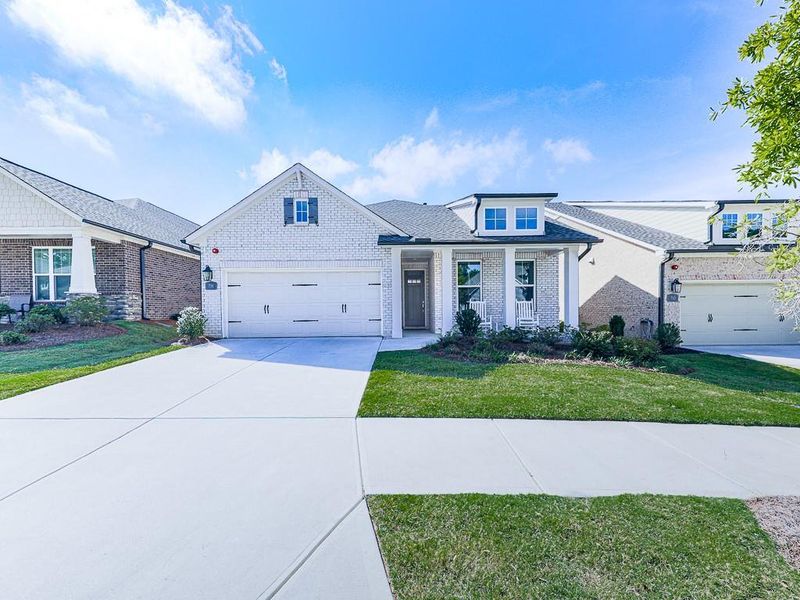 Front exterior of a new home in Glenhaven at Ridgewalk, Woodstock, GA, highlighting curb appeal (Image 31).