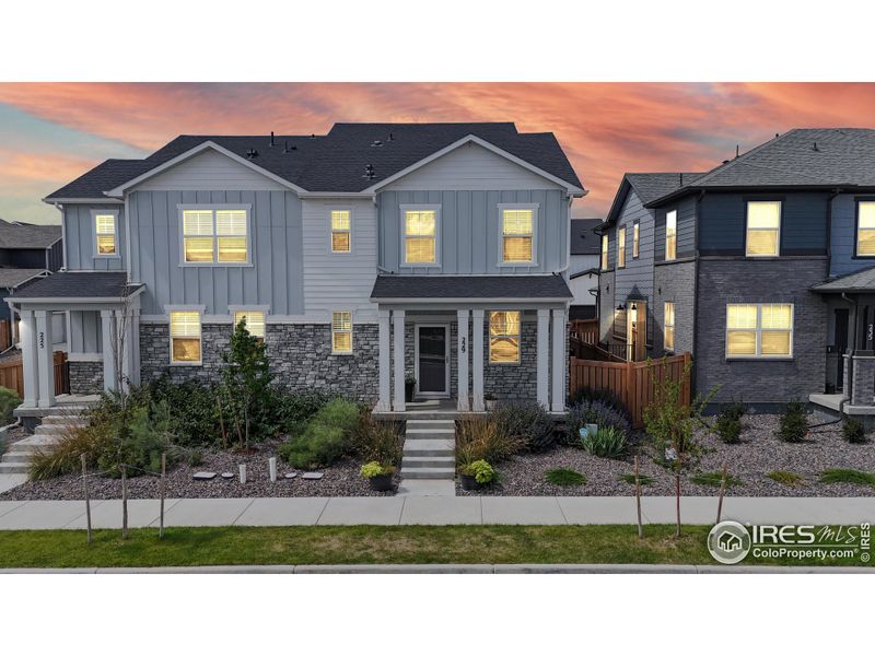 Front exterior of a new home in Fickel Farms, Berthoud, CO, highlighting curb appeal (Image 2).