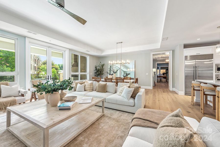 Hardwood floors through living spaces and primary bedroom.