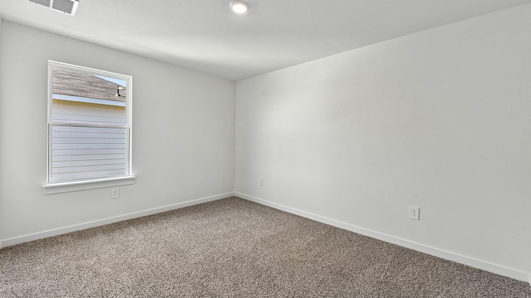 Spacious, unfurnished interior of a new home in Monarch Ranch, Manor (Image 37).