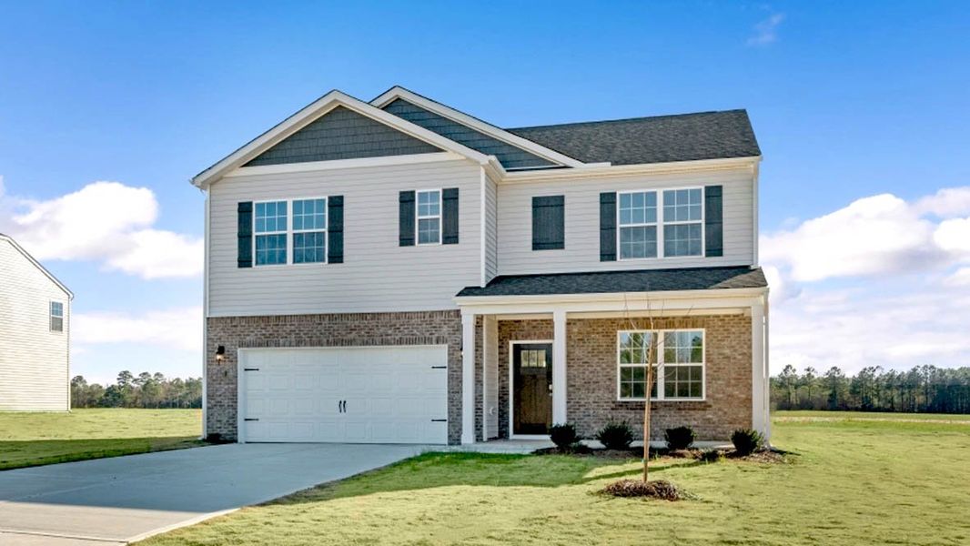 Representative exterior photo of a completed home built from the HAYDEN by D.R. Horton in The Reserve at Stoney Creek, Whitsett, NC (Image 21).