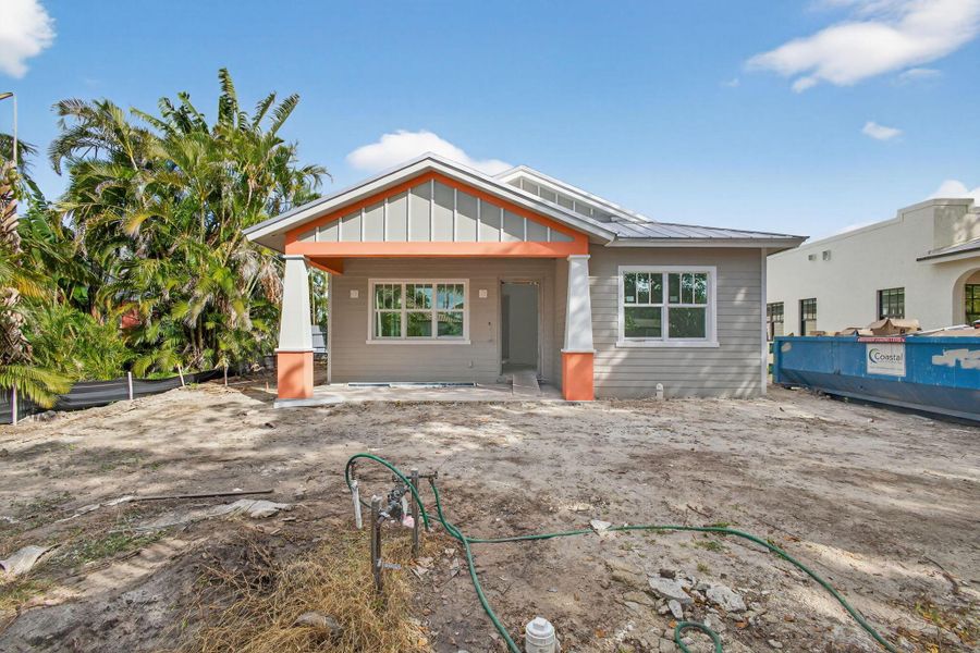 Front exterior of a new home in , West Palm Beach, FL, highlighting curb appeal (Image 23). Front exterior of a new home in , West Palm Beach, FL, highlighting curb appeal (Image 23).