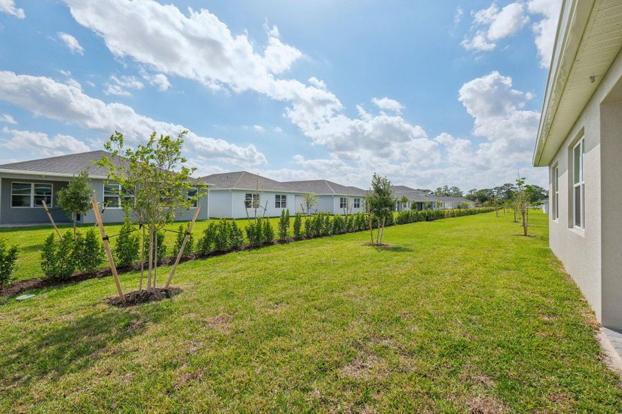 Exterior details and patio area of a home in Brystol at Wylder - Reserve Series, Port St. Lucie (Image 21). Exterior details and patio area of a home in Brystol at Wylder - Reserve Series, Port St. Lucie (Image 21).