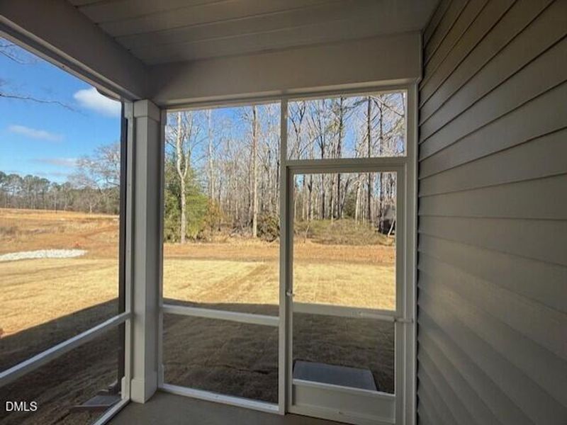 Exterior details and patio area of a home in Woodland Crossing, Zebulon (Image 2).