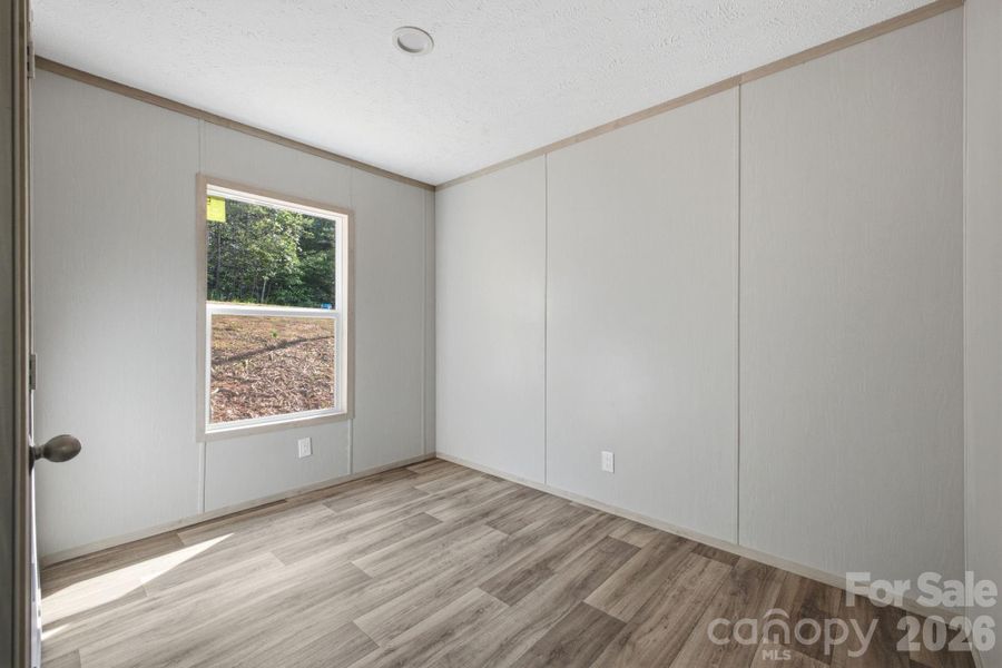 Spacious, unfurnished interior of a new home in , Connelly Springs (Image 10).