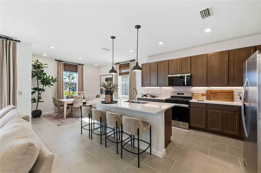 Furnished interior view inside a new home in Brystol North at Wylder, Port St. Lucie (Image 8).