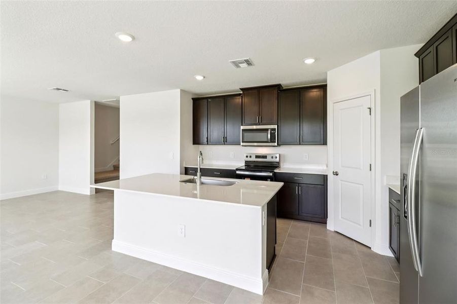 Furnished interior view inside a new home in The Reserve at Hammock Oaks - Classic Series, Lady Lake (Image 11).