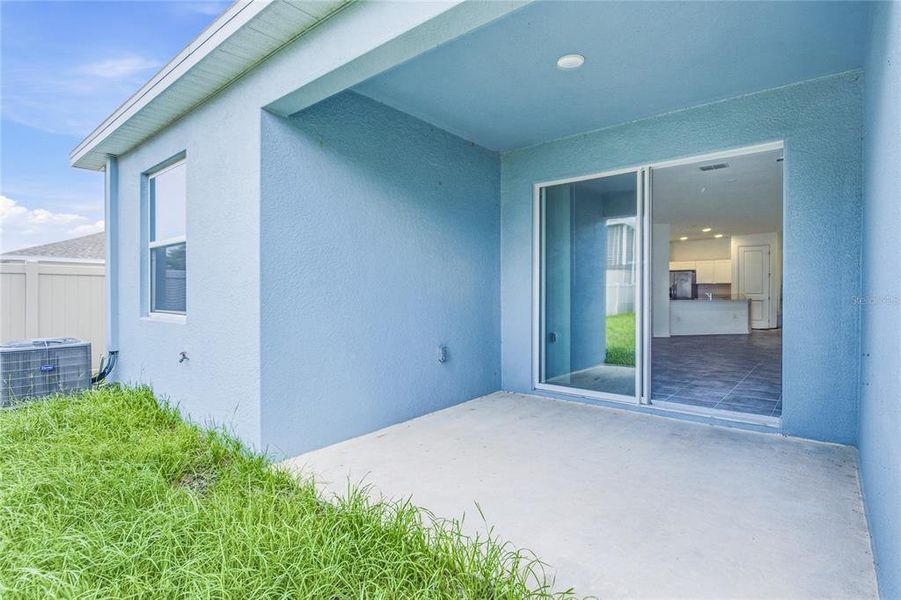 Exterior details and patio area of a home in Peace Creek Reserve, Winter Haven (Image 25).