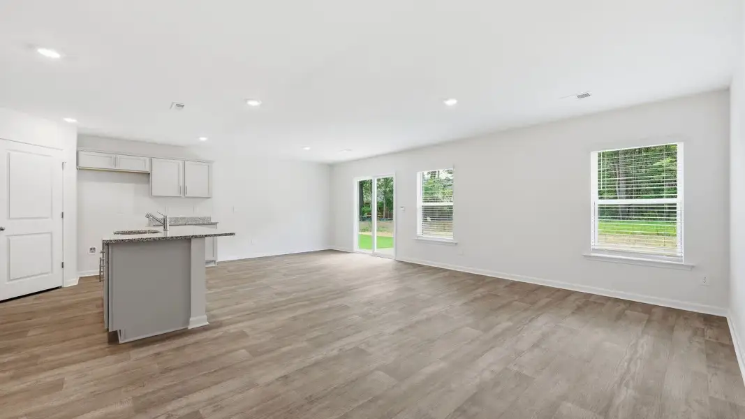 Representative unfurnished interior of a home built from the Freeport II - Express by D.R. Horton in Savannah Place, Wilson (Image 12).