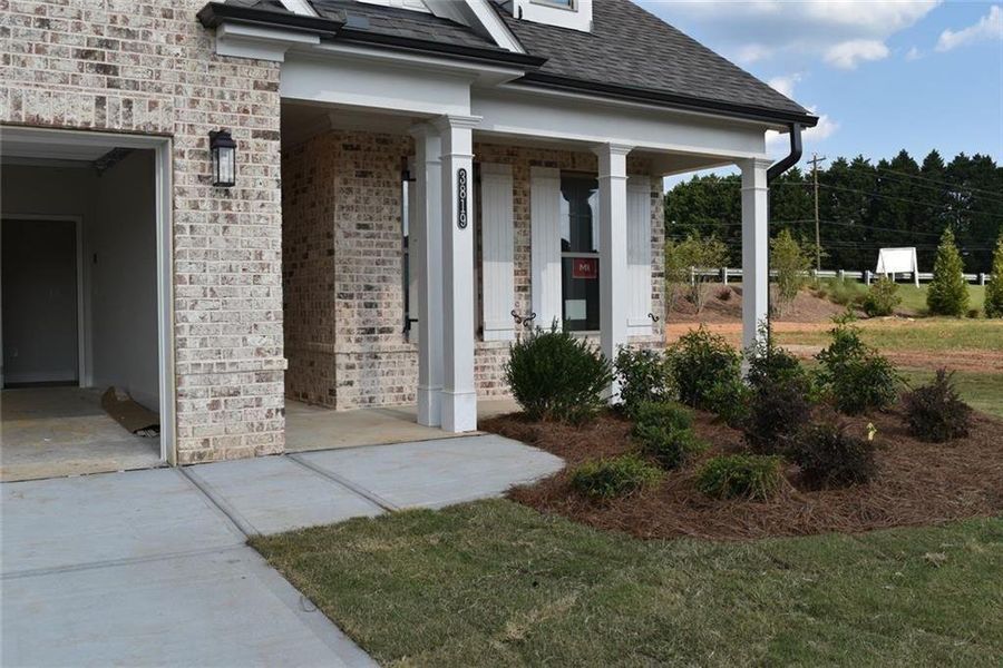 Exterior details and patio area of a home in Soleil Summit Chase, Snellville (Image 3).