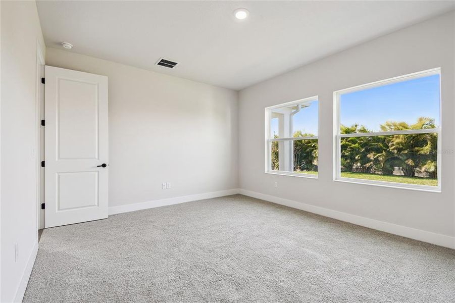 Spacious, unfurnished interior of a new home in Waterset Tradition Series, Apollo Beach (Image 26).