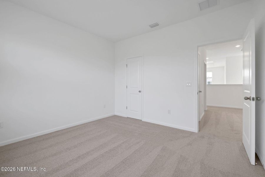 Spacious, unfurnished interior of a new home in The Hammock at Palm Harbor, Palm Coast (Image 26).