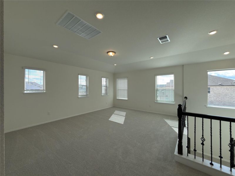 Spacious, unfurnished interior of a new home in River Bluff, Leander (Image 32).