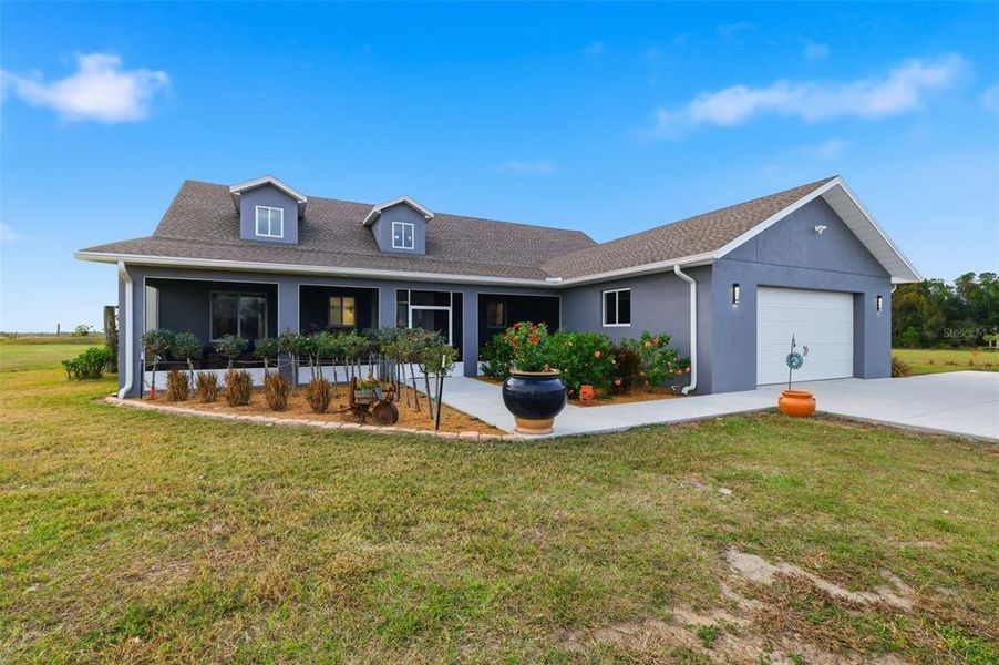 Front exterior of a new home in , Dade City, FL, highlighting curb appeal (Image 23).
