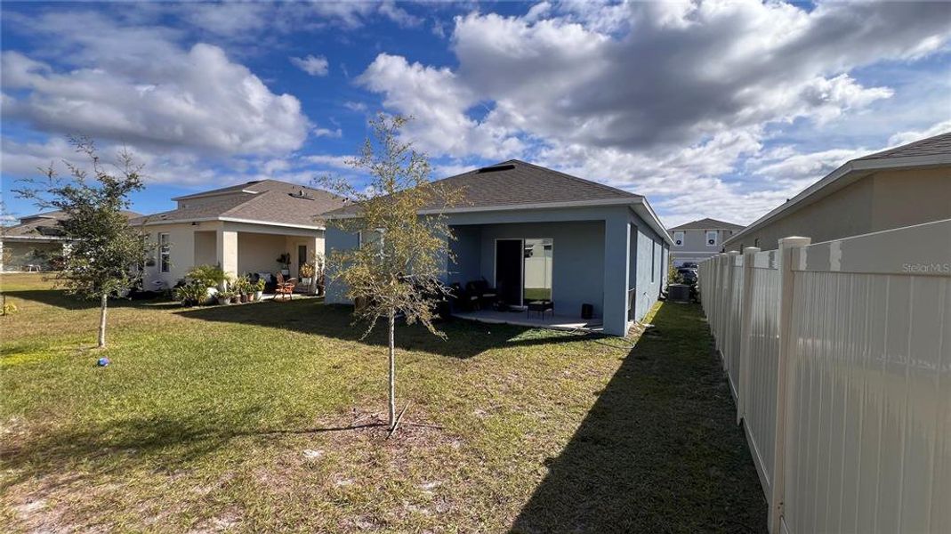 Exterior details and patio area of a home in Harmony West, St. Cloud (Image 3).