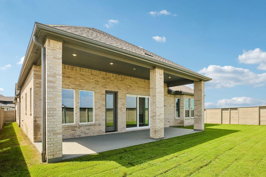 Exterior details and patio area of a home in Legacy, Friendswood (Image 4).