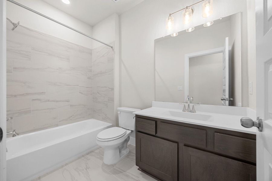 Furnished interior view inside a new home in Parmer Ranch - 60', Georgetown (Image 12).