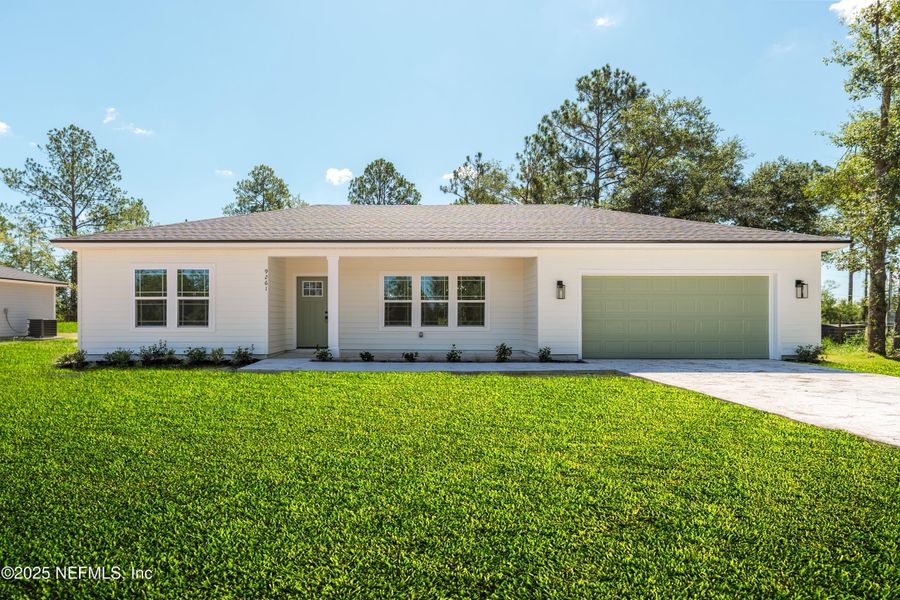 Front exterior of a new home in , Keystone Heights, FL, highlighting curb appeal (Image 1). Front exterior of a new home in , Keystone Heights, FL, highlighting curb appeal (Image 1).