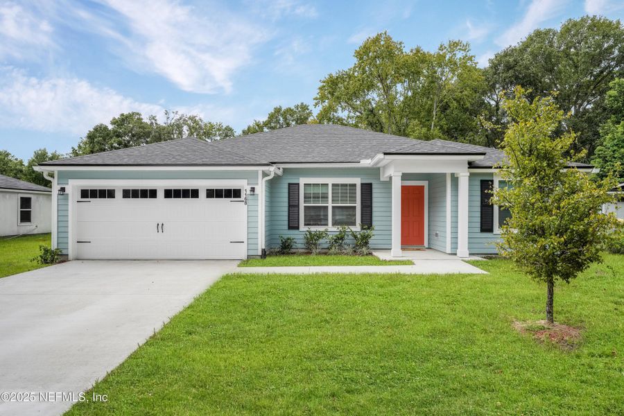 Front exterior of a new home in , Jacksonville, FL, highlighting curb appeal (Image 18).