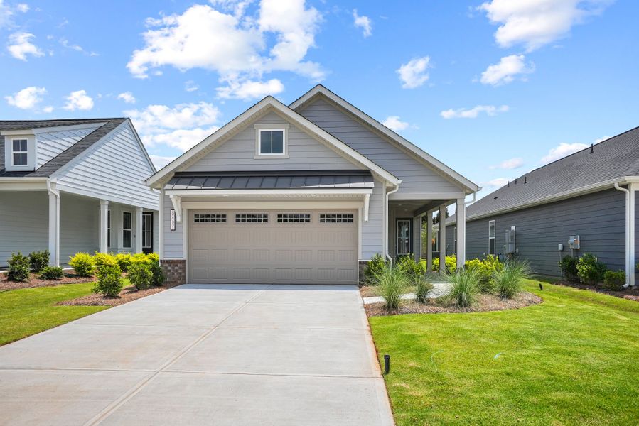 Front exterior of a new home in Carolina Riverside, Belmont, NC, highlighting curb appeal (Image 36). Front exterior of a new home in Carolina Riverside, Belmont, NC, highlighting curb appeal (Image 36).