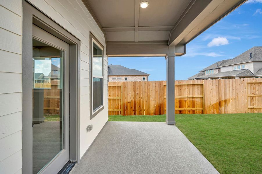 Exterior details and patio area of a home in The Grand Prairie - Retreat Collection, Hockley (Image 28). Exterior details and patio area of a home in The Grand Prairie - Retreat Collection, Hockley (Image 28).