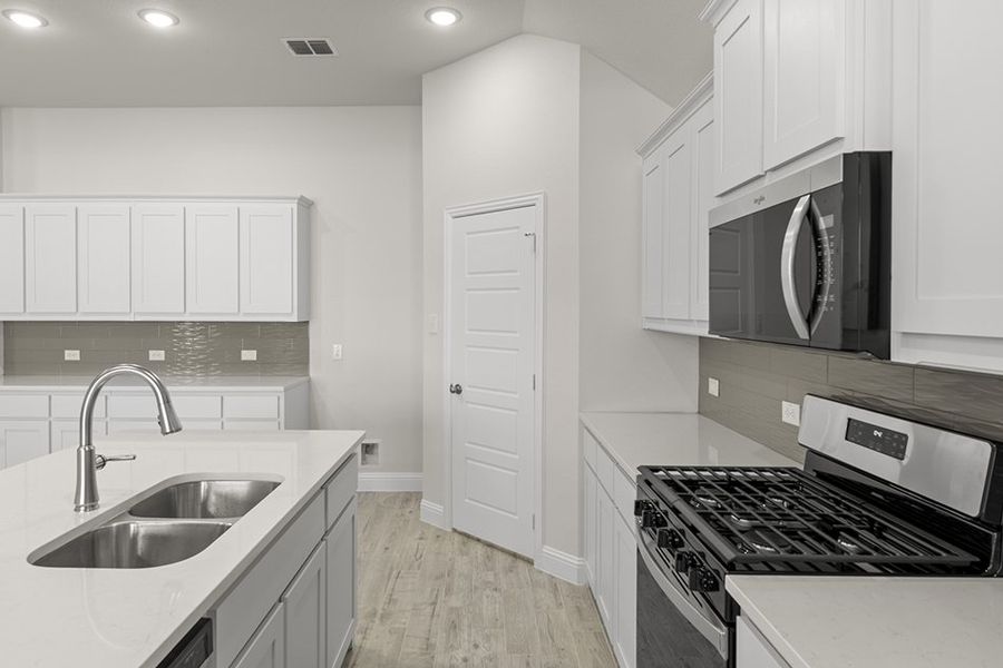 Representative exterior photo of a completed home built from the Cambridge by Impression Homes in Arcadia Trails, Balch Springs, TX (Image 7). Representative exterior photo of a completed home built from the Cambridge by Impression Homes in Arcadia Trails, Balch Springs, TX (Image 7).