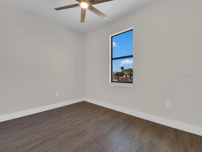 Spacious, unfurnished interior of a new home in , Port Charlotte (Image 15).