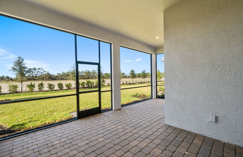 Exterior details and patio area of a home in Del Webb Oak Creek, North Fort Myers (Image 16).