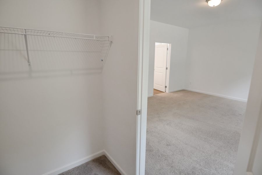 Spacious, unfurnished interior of a new home in Marlin Pointe, White House (Image 23).