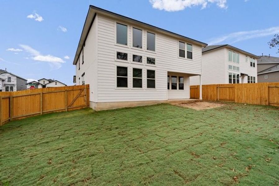 Front exterior of a new home in Morningstar, Georgetown, TX, highlighting curb appeal (Image 7).