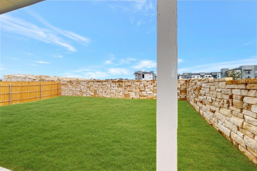 Exterior details and patio area of a home in Estancia West, Manchaca (Image 4).
