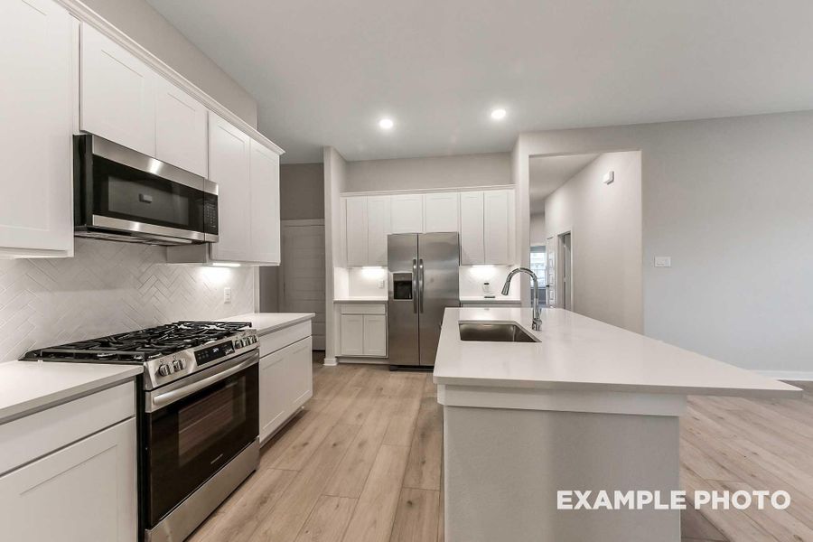 Furnished interior view inside a new home in Sunterra, Katy (Image 4).
