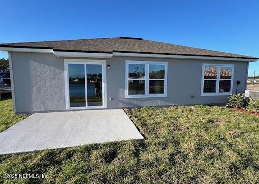 Exterior details and patio area of a home in Sawmill Branch, Palm Coast (Image 3). Exterior details and patio area of a home in Sawmill Branch, Palm Coast (Image 3).