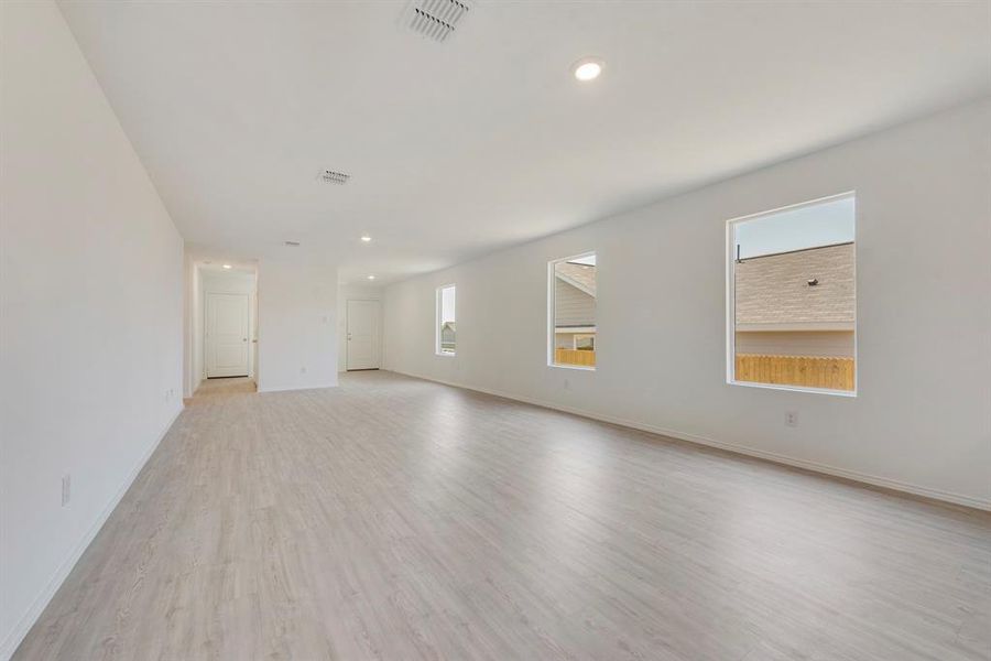 Empty room with light wood-type flooring