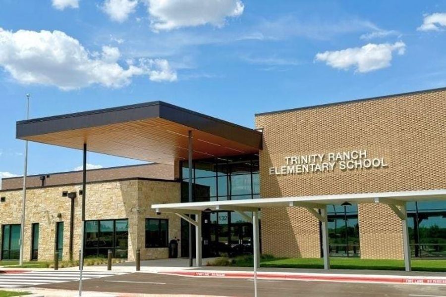 Front exterior of a new home in The Ridge at Trinity Ranch, Elgin, TX, highlighting curb appeal (Image 1).