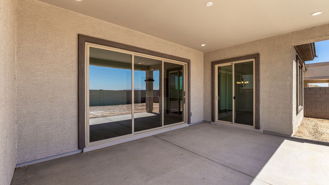 Exterior details and patio area of a home in Windrose, Waddell (Image 3).