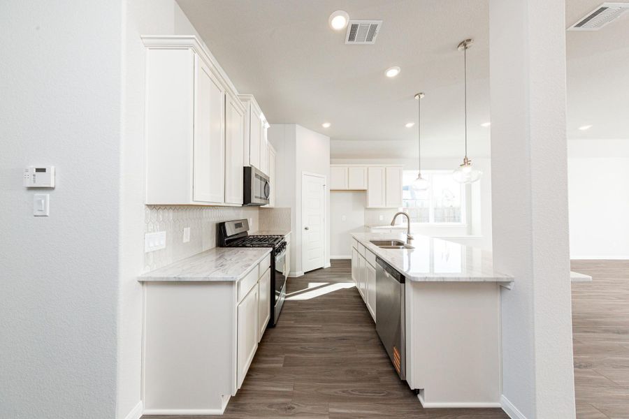 Photos are a representation of the floor plan. Options and interior selections will vary.