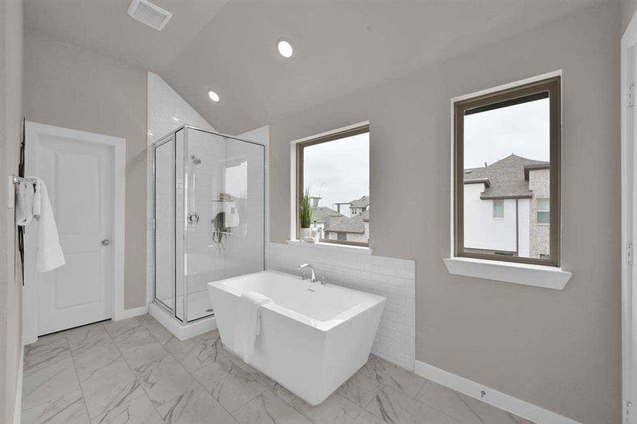 Spa-like ensuite with quartz counters and dual sinks. (Original Builder Staged Photo 2024)