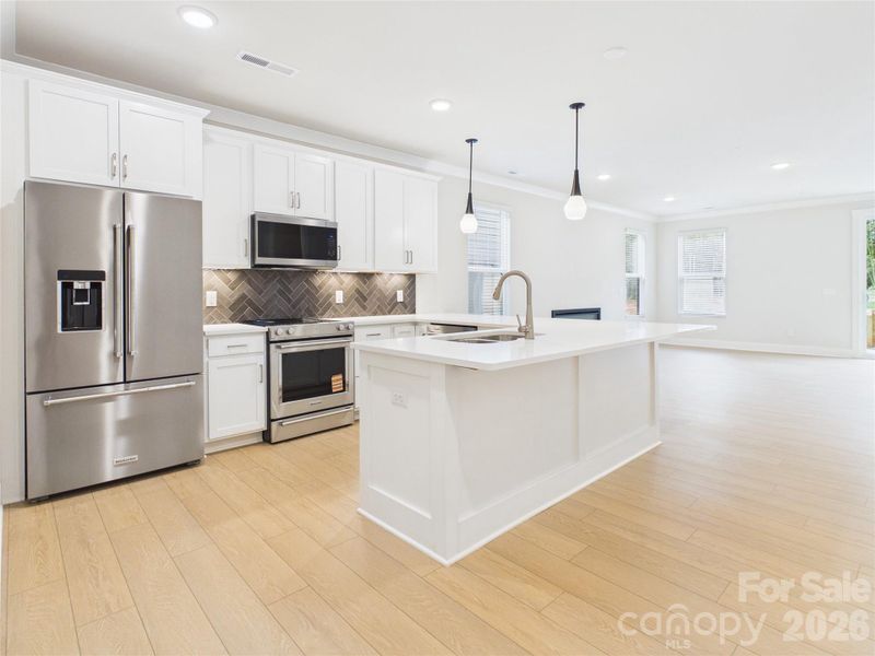 Soft close cabinets and drawers throughout.