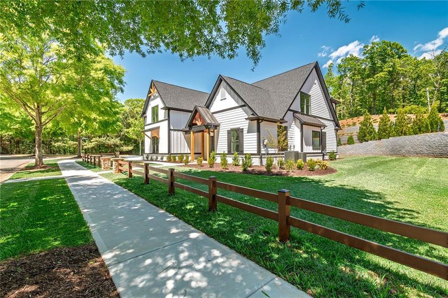 Front exterior of a new home in , Gainesville, GA, highlighting curb appeal (Image 28).