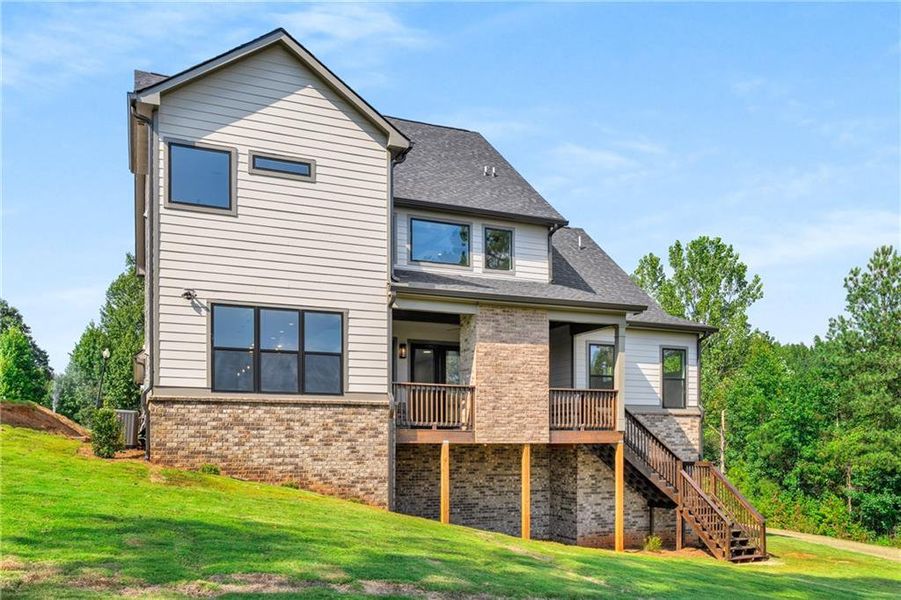 Front exterior of a new home in , Jefferson, GA, highlighting curb appeal (Image 1).
