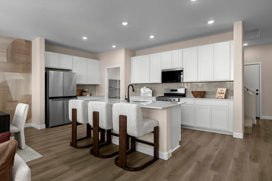 Representative furnished interior of a home built from the 1998 Modeled by KB Home in The Landings at Rancho Del Lago, Vail (Image 6).
