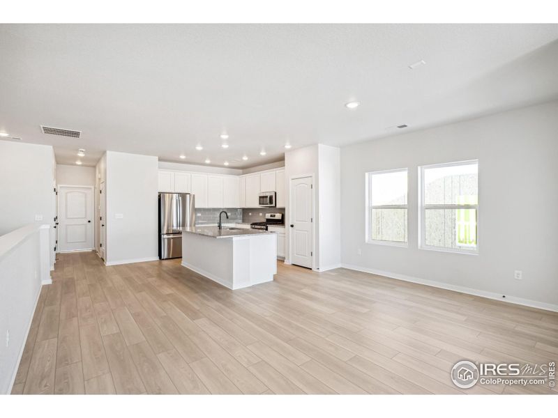 Spacious, unfurnished interior of a new home in Kinston Mainstreet Townhomes, Loveland (Image 30).
