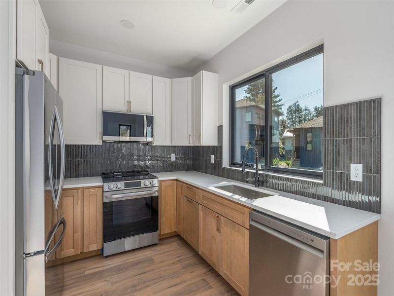 Furnished interior view inside a new home in , Waynesville (Image 6).